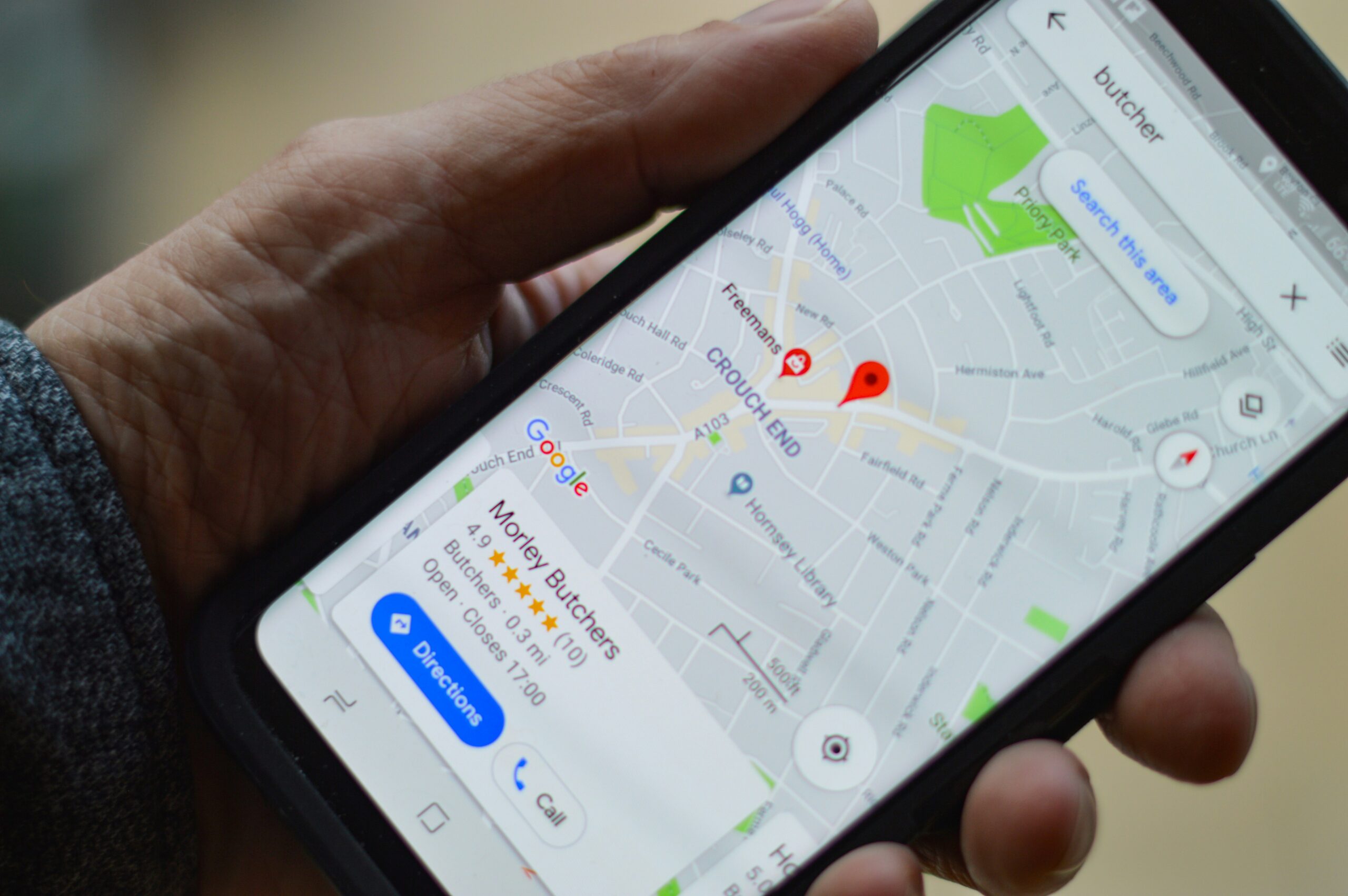 person holding black smartphone | Optimizing Your Google My Business for better Local SEO
