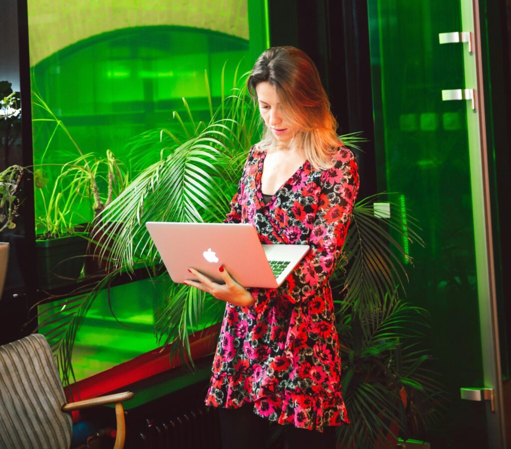 A woman working on a laptop