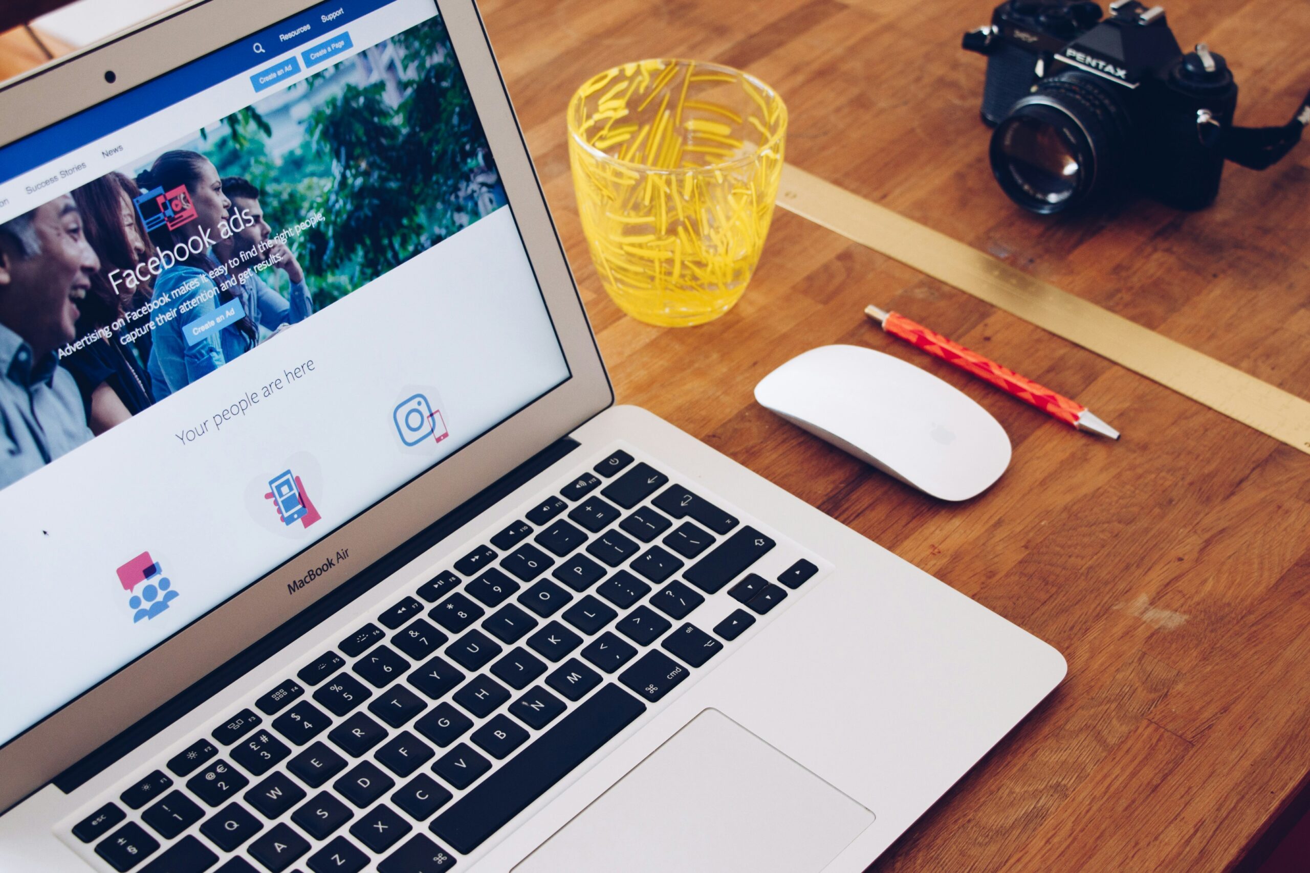 MacBook Air on table | Use Facebook as a Business Website
